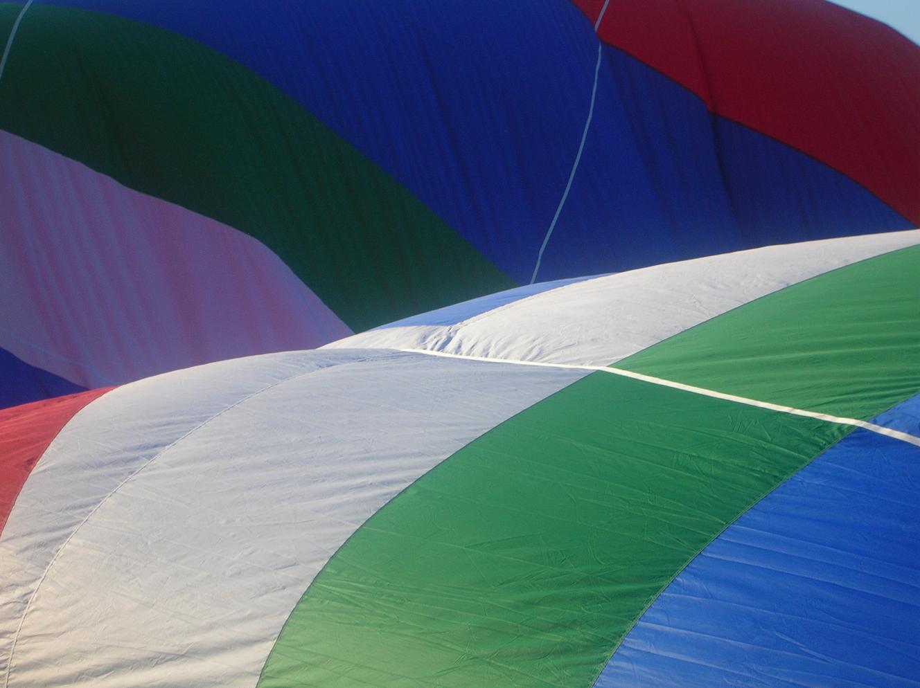 Colors from a hot air balloon, which the brain knows are identical, even though they are not