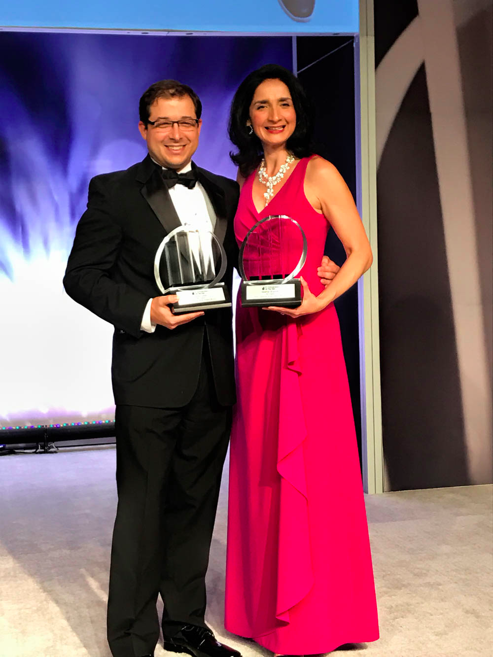Jason Cohen and Heather Brunner winning the E&Y Central Texas Entrepreneur of the Year Award 2017