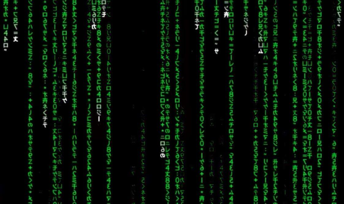 Symbols from the movie The Matrix, filling in a black background