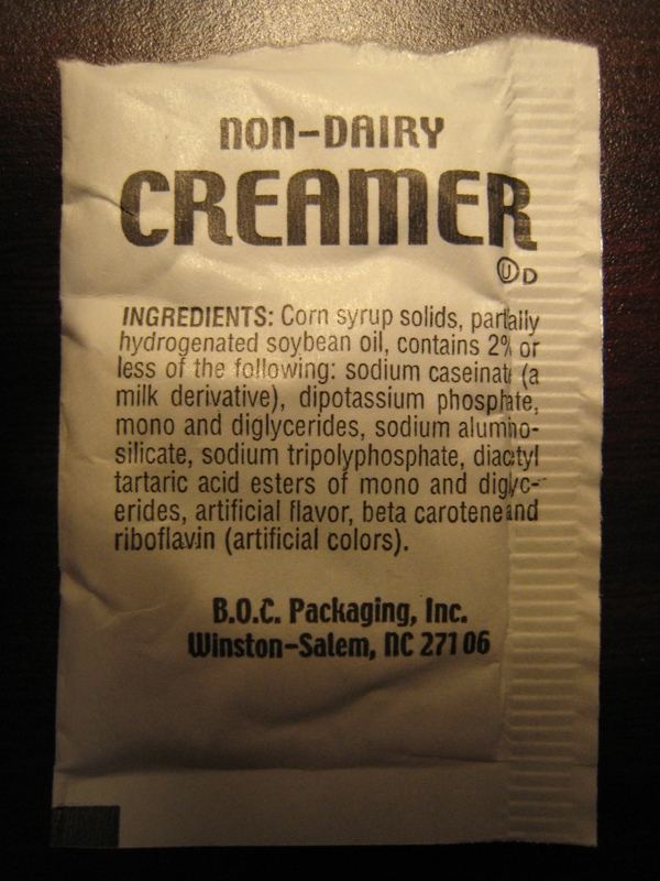 non-dairy creamer packet with trash ingredients